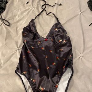 Lioness rose body suit